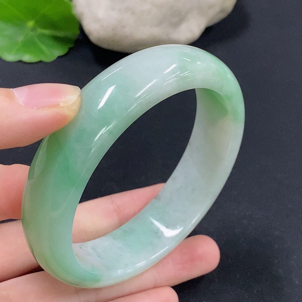 Jadeite round bracelet in size 58.8, with a total weight of 74.38g, featuring smooth polished jade stones.