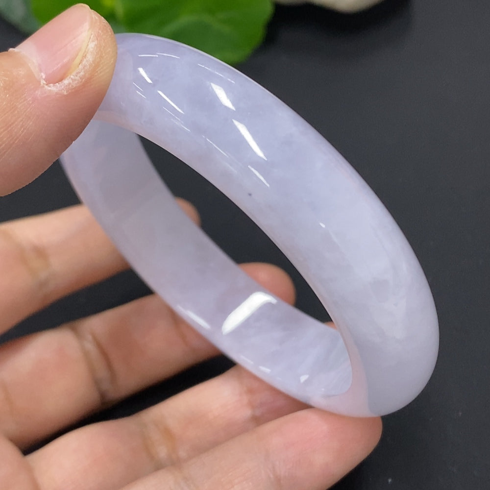 HKHQ jadeite round bangle size 56.6 with an approximate weight of 67.5g, showcasing smooth, polished jadeite surface.