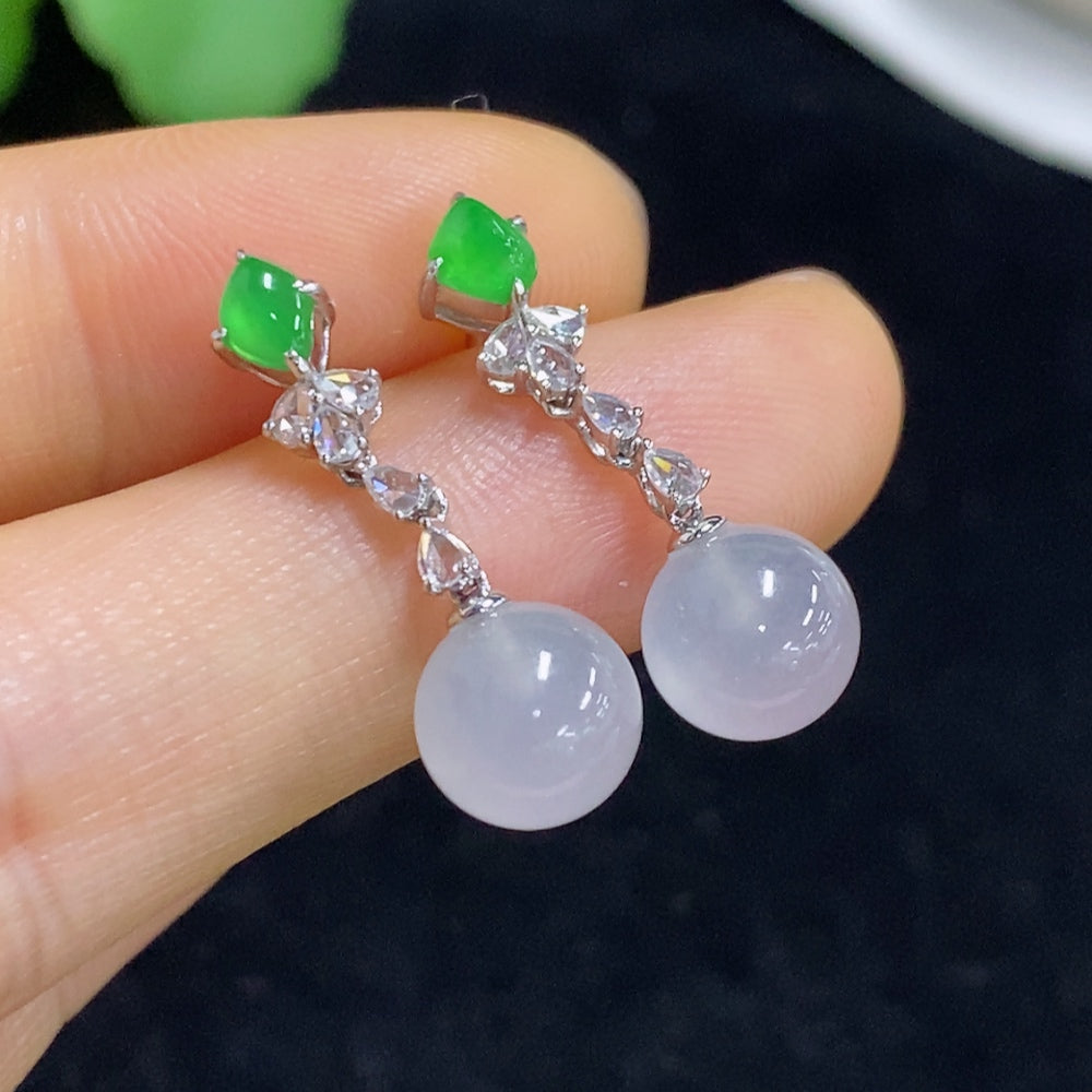 Jadeite earrings set in 18K gold with diamond accents