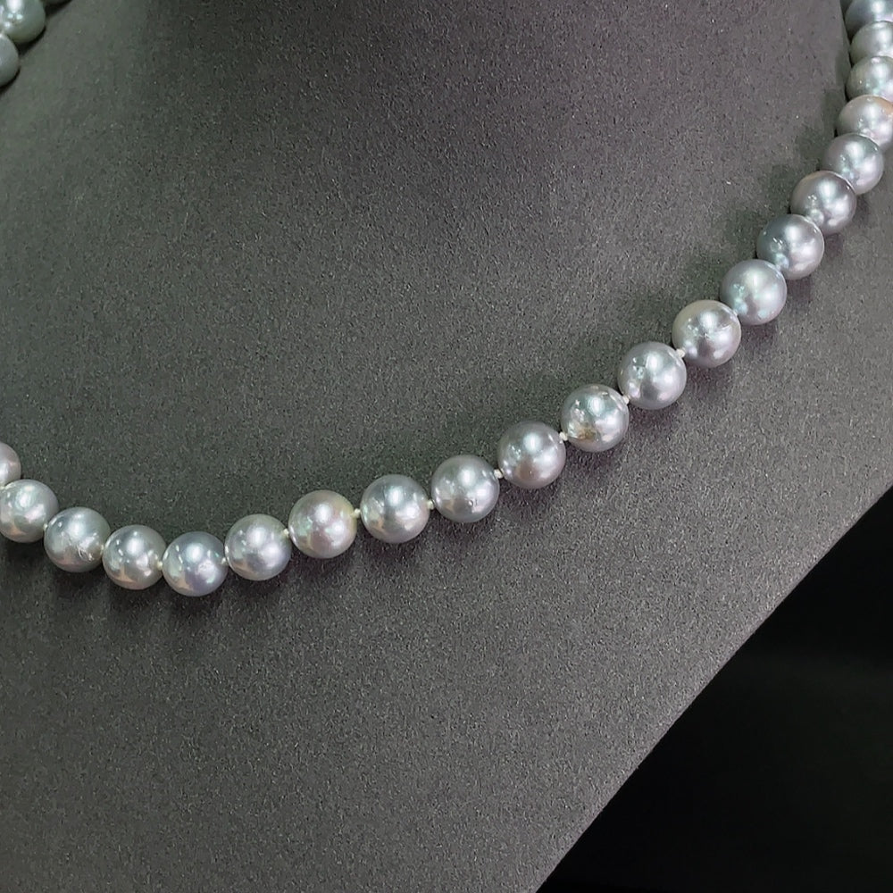 Saltwater pearl strand necklace by HKHQ featuring lustrous white pearls on a classic, elegant jewelry piece.