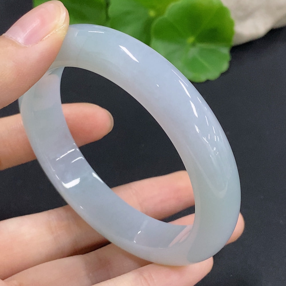 HKHQ jadeite round bangle in size 56.1, weighing 57.8g, featuring smooth green jadeite and polished finish on a jewelry bracelet
