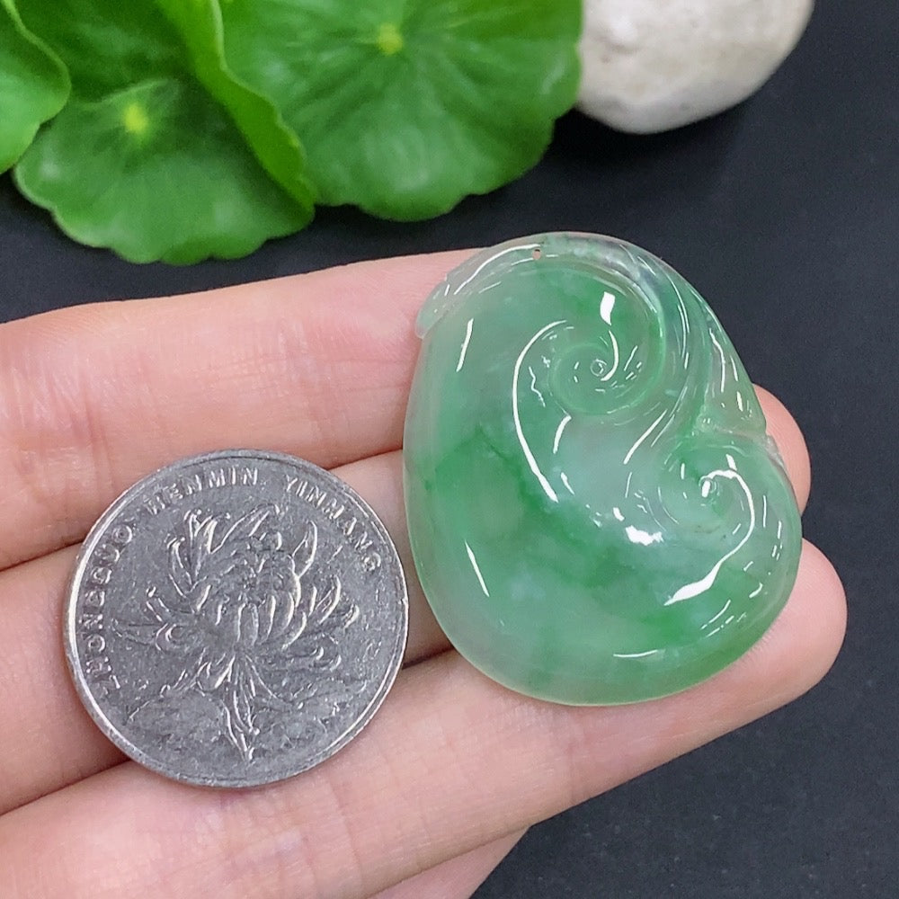 Jadeite Ruyi pendant from HKHQ, smooth green jade with intricate carvings, weighs approximately 10.5g, elegant traditional jewelry piece