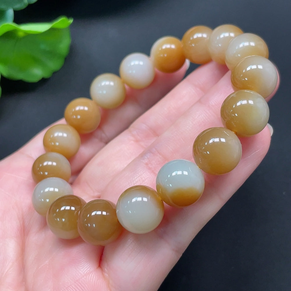 HKHQ Hetian jade bracelet, 11.9mm beads, approximately 44.96g, showcasing smooth green jade stones on a delicate bracelet.