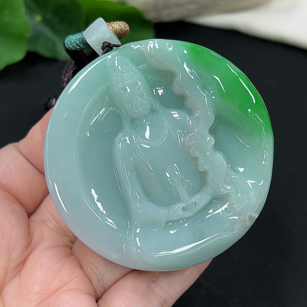 Jadeite Guanyin pendant with detailed carving, weighing approximately 101g including rope, showcasing smooth jade surface and craftsmanship.