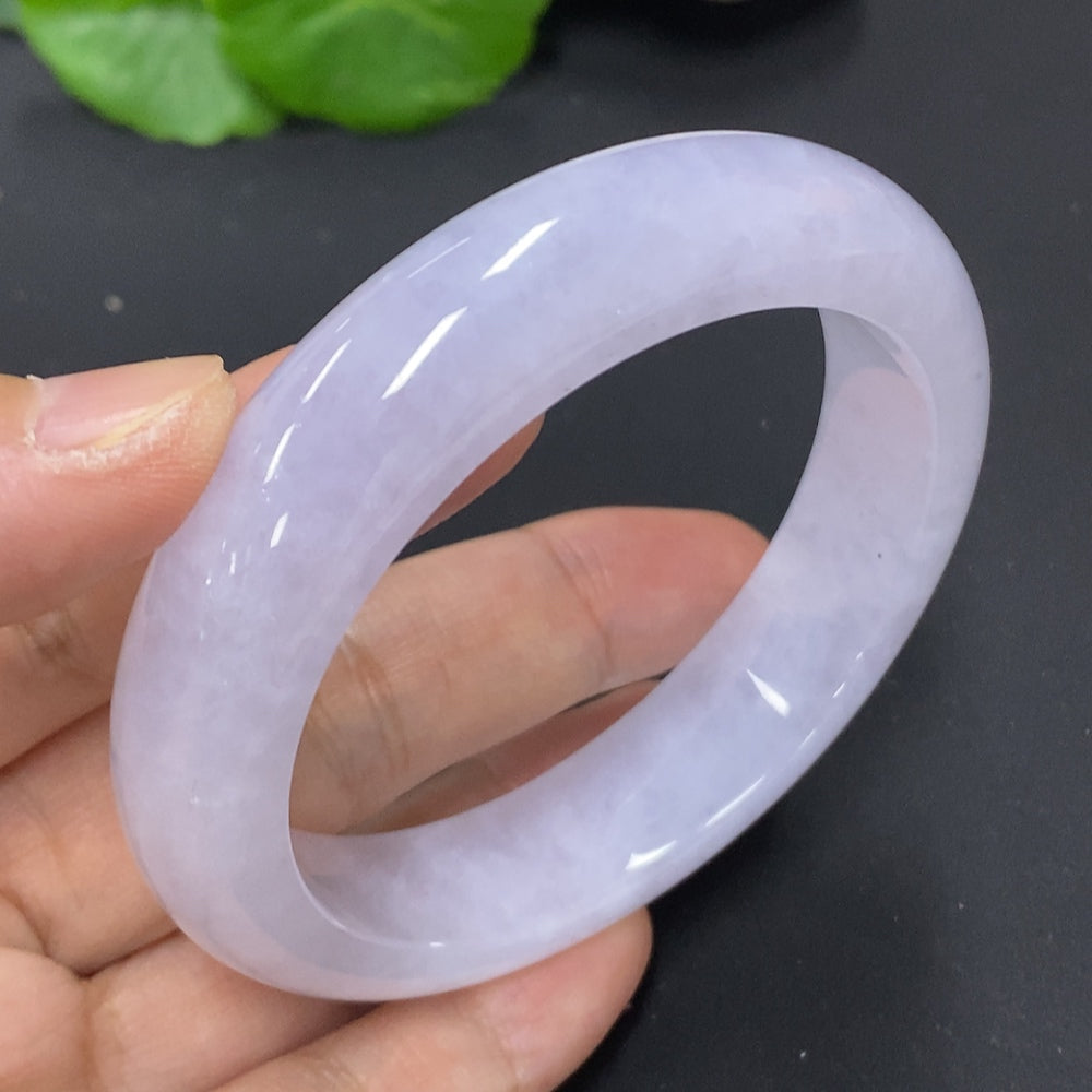 HKHQ jadeite round bangle, size 56.6, weighing approx. 67.5g, featuring smooth, polished jadeite surface and elegant design.