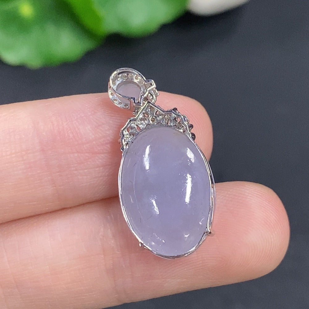 Jadeite cabochon pendant with 18K gold, non-diamond (too small to determine natural origin)