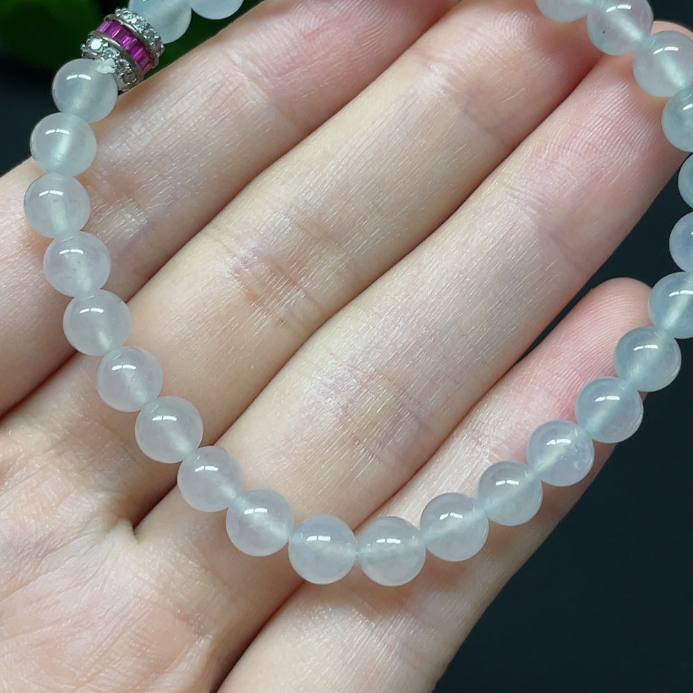 HKHQ jadeite bracelet with non-gold beads, total weight 10.66g, bead size 5.8mm, featuring smooth green jade beads.