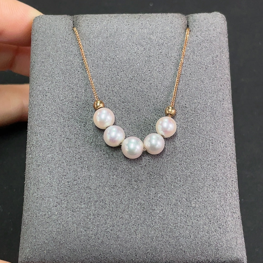 Seawater pearl necklace with 18k gold clasp, featuring approximately 5.6mm pearls, total weight 2.32g, from HKHQ.