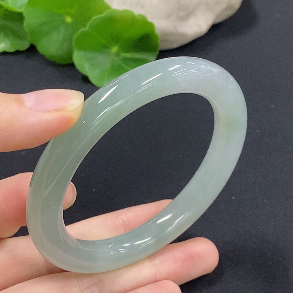 Jadeite round bangle in size 56 with a total weight of 54.11g, featuring smooth, polished jadeite from HKHQ.