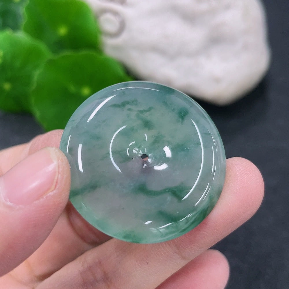 Jadeite pendant with peace knot design, weighing approximately 11.18g, crafted from high-quality jade by HKHQ.