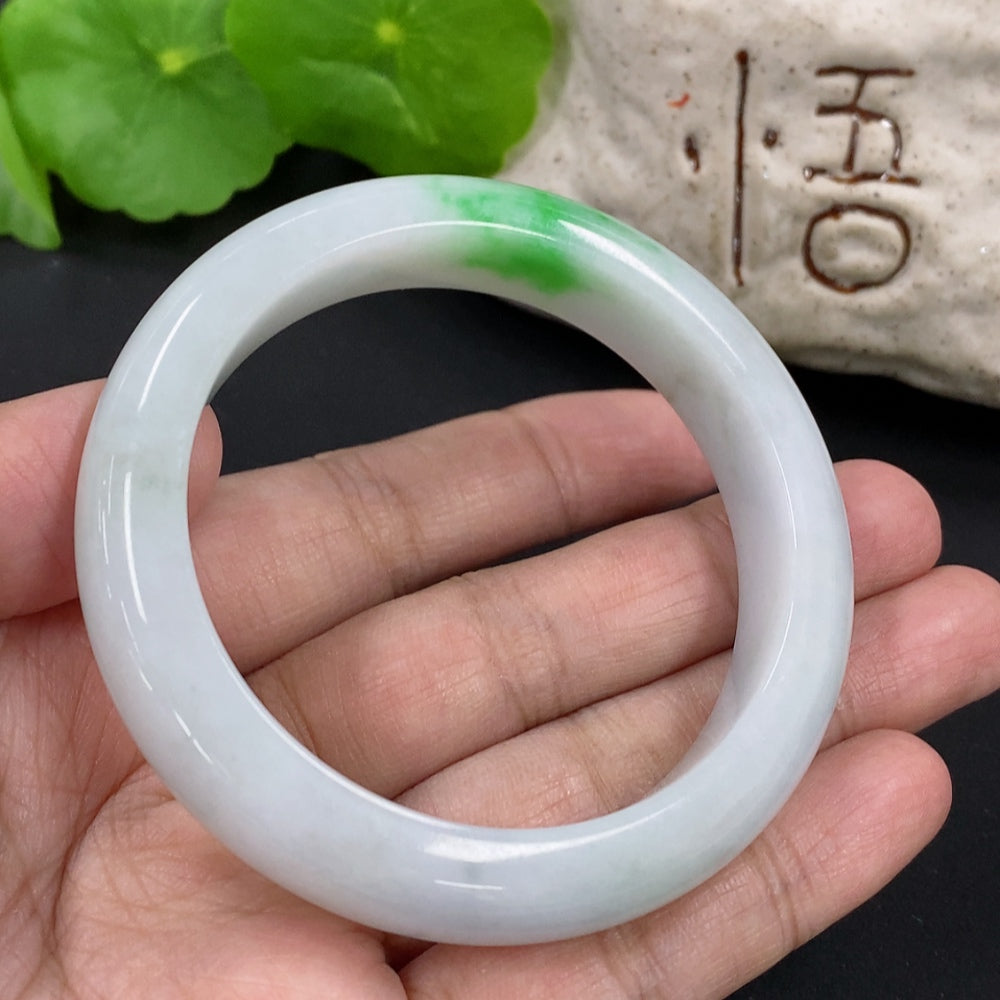 HKHQ jadeite round bangle, size 52.7, weighing 53.25g, showcasing smooth, polished jadeite with a glossy finish.