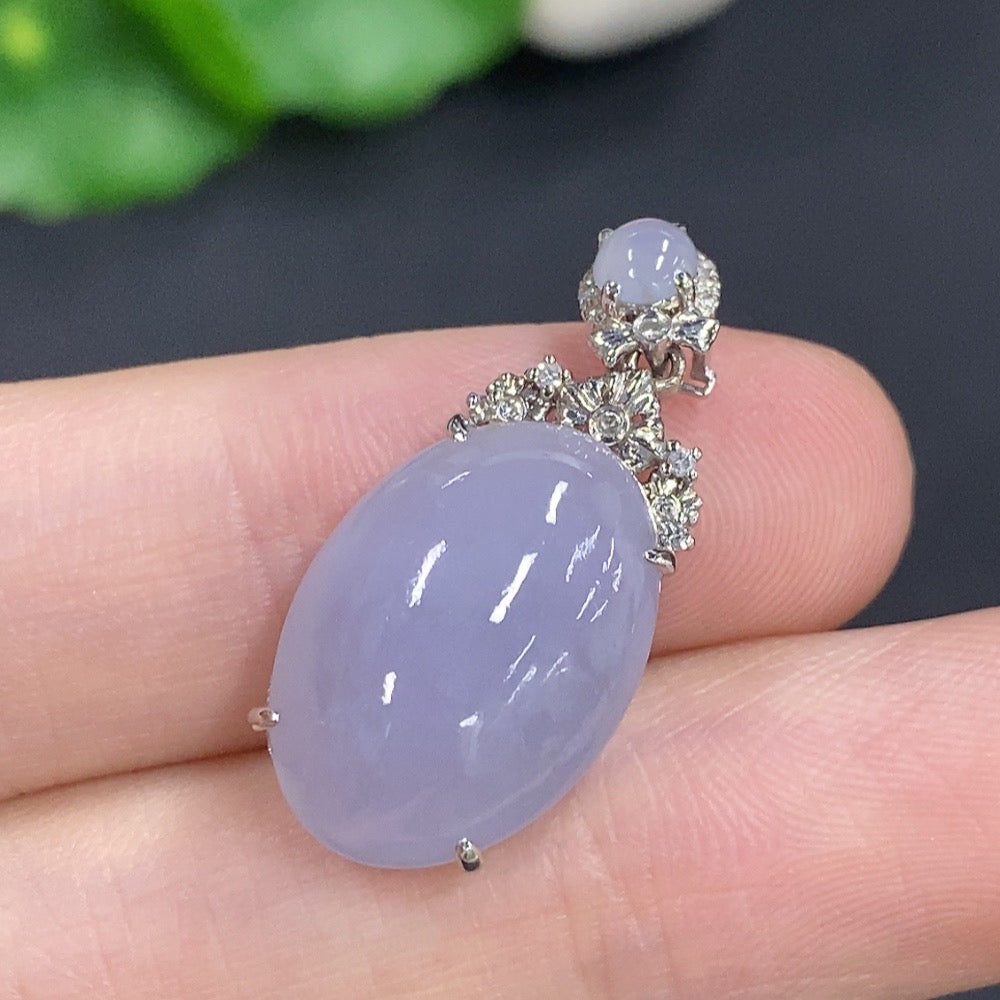Jadeite cabochon pendant with 18K gold, non-diamond (too small to determine natural origin)