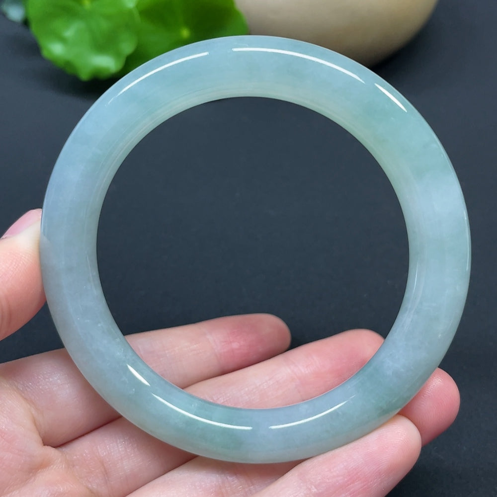 HKHQ jadeite round bangle, size 56.8, weighing 53.94g, smooth polished surface, showcases vibrant green jadeite bracelet.