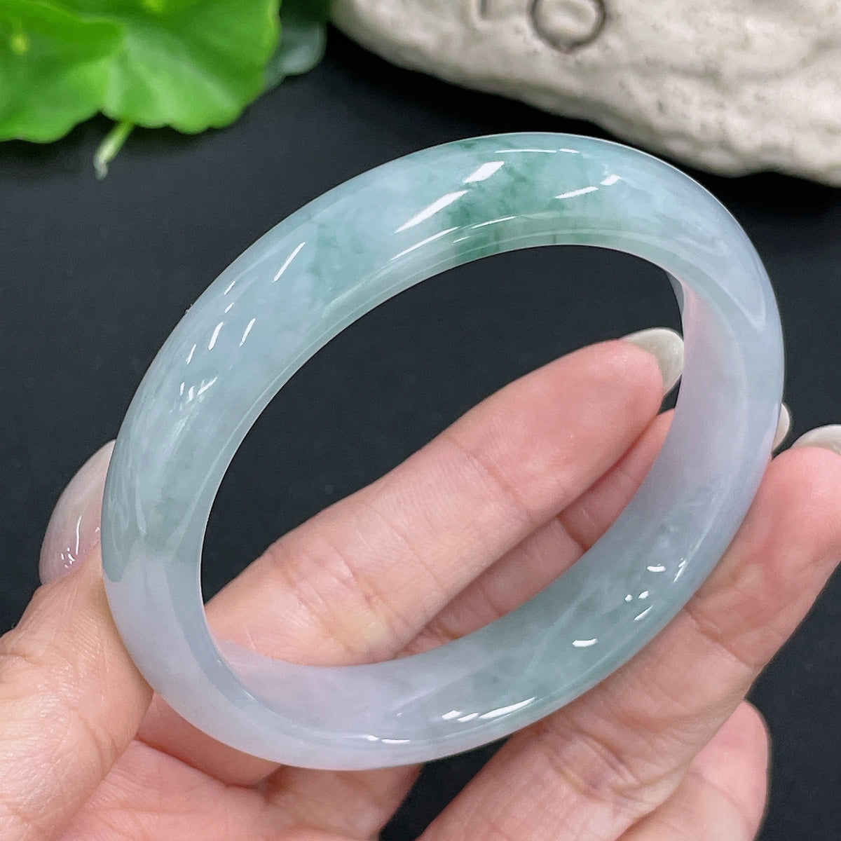 HKHQ jadeite round bangle, 54.6g, size 56.3, showcasing smooth, polished jadeite with a circular design.