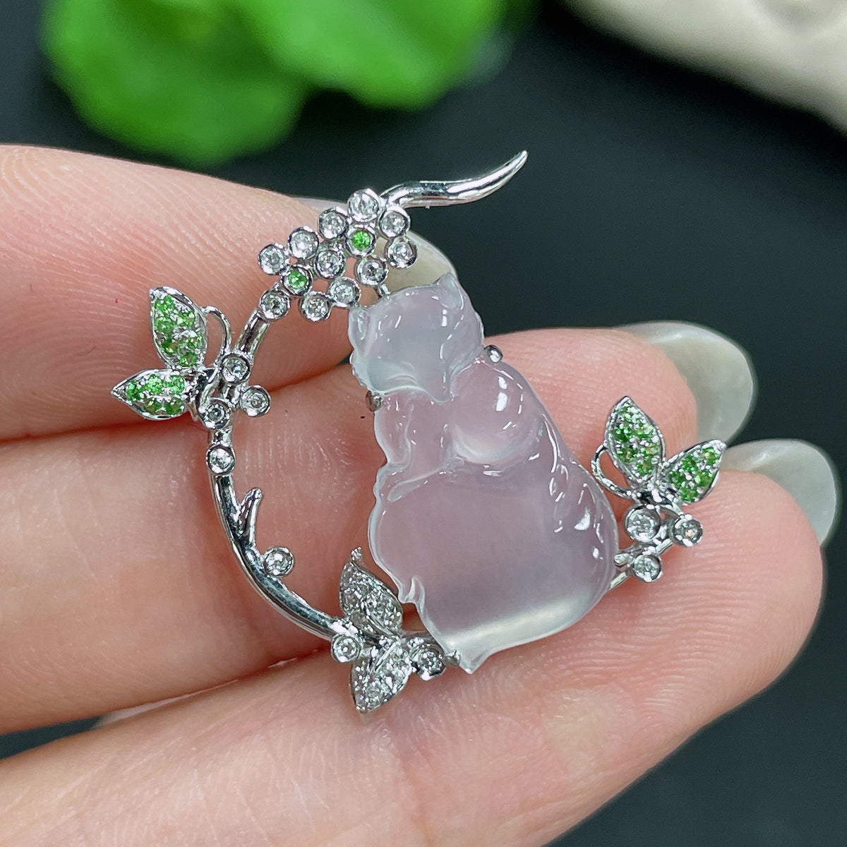 Jadeite pendant set in 18k gold with diamonds, featuring a green jade stone, weighing approximately 3.05g, by HKHQ.