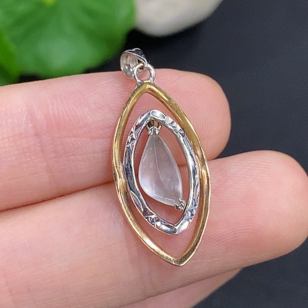 Jadeite inlaid pendant on a delicate necklace with 18k gold setting, weighing approximately 1.75g, by HKHQ.