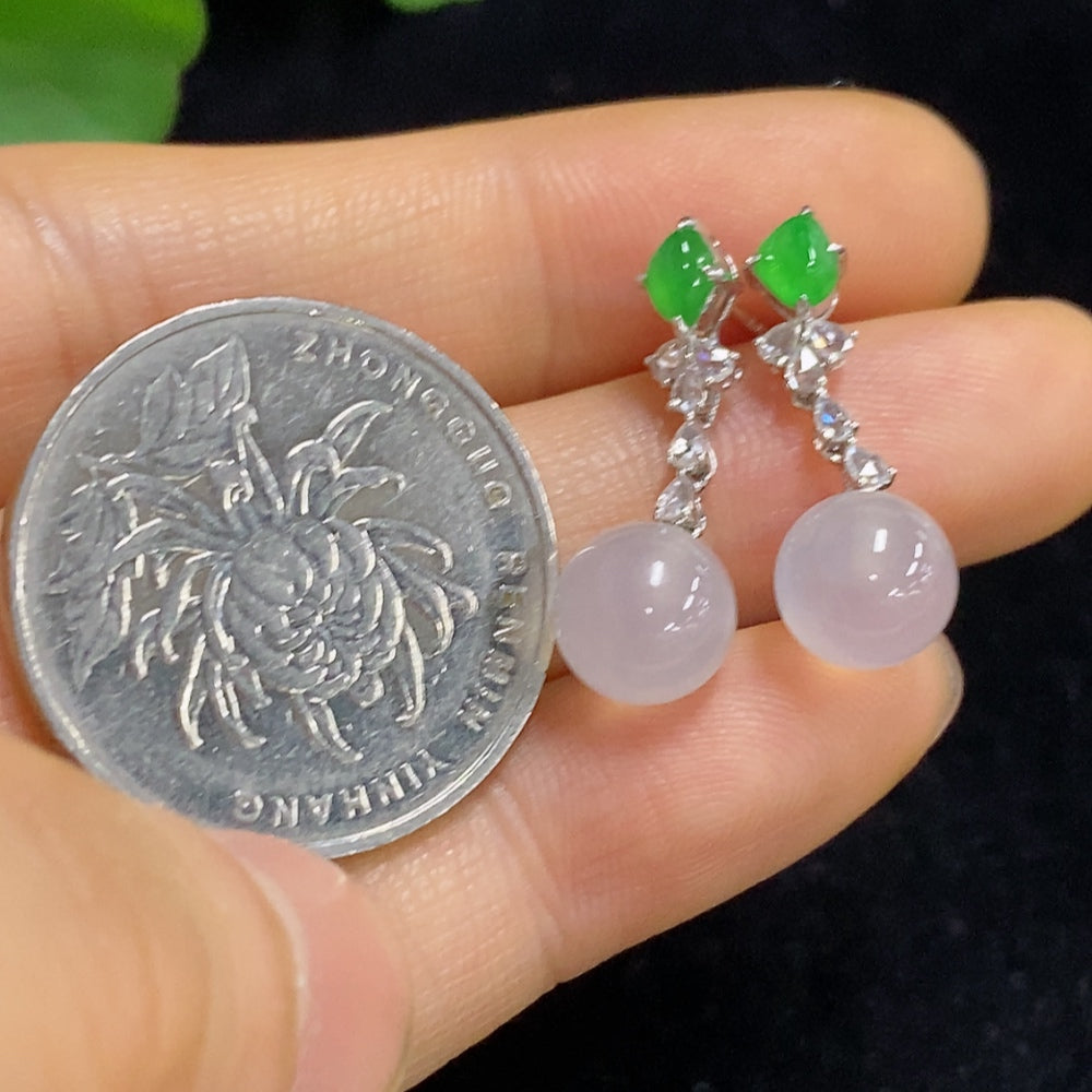 Jadeite earrings set in 18K gold with diamond accents