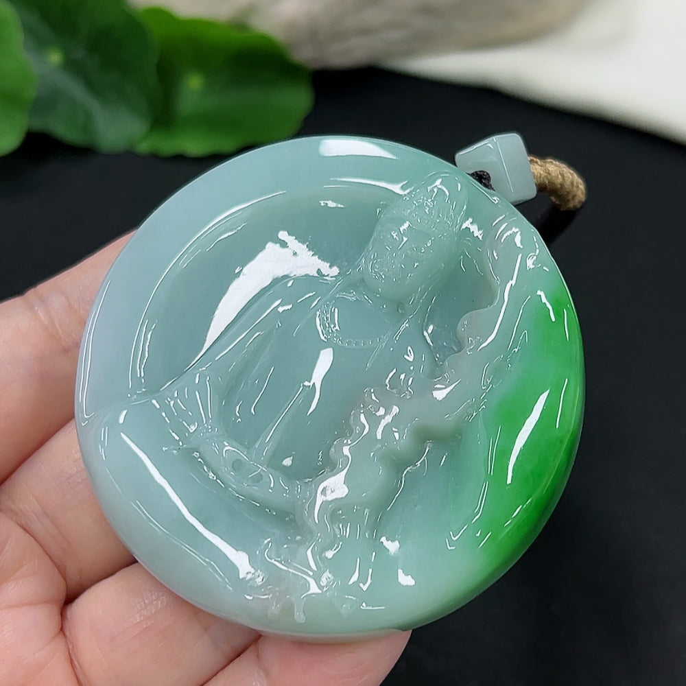 Jadeite Guanyin pendant from HKHQ featuring a detailed carved figure, weighing approximately 101 grams including rope.