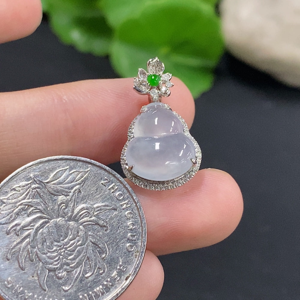 Jadeite pendant in gourd shape with 18k gold and diamond accents, weighing approximately 1.9g, by HKHQ.